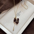 Elegante Vintage-Halskette mit beflockten Traubentasseln und goldener Schlangenkette - Goldkette-Kaffee-Trauben-Stil