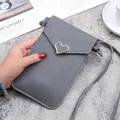 Minimalist grey touchscreen phone bag with heart metal buckle and crossbody strap - Dark Gray