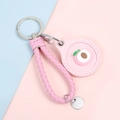 Pink cartoon peach leather key fob cover with woven strap and metallic ring - Hand Strap Style - Round Peach