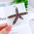 Sparkling purple starfish hair clip with crystal rhinestones on a golden alloy base - Starfish Purple