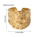 Detail view of gold titanium steel ring with hammered texture, 2cm height and 7g weight - Vintage Irregular Hammered