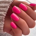 Macro detail of glossy rose pink press-on nails in square-oval shape with knit sweater background - Rose Pink Glossy Squoval Style (CW526)