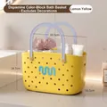 Lemon yellow plastic shower caddy with blue handle and perforated drainage design - Basic Style / Lemon Yellow