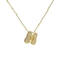 Detail of gold bubble letter N pendant necklace with shimmering zircon stones - Letter M / Gold