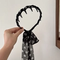 Polka dot ribbon headband with inner hair comb teeth for elegant styling - Ribbon Headband / Black