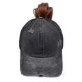 Detail of washed black ponytail baseball cap featuring distressed holes and mesh back - One Size / Black and Gray