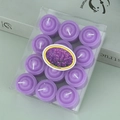 Vue détaillée de 12 bougies chauffe-plat spirales violettes sous emballage plastique - Violet