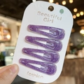 Set de cuatro pinzas para el cabello con purpurina morada para niñas en cartón - Morado