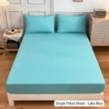 Lakeside blue fitted sheet set with matching pillowcases in a minimalist bedroom setup - Lake Blue