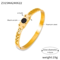 Goldenes Titanstahl-Armband mit schwarzer Acryl-Einlage und 6cm Innendurchmesser - Gold Schwarz Acryl