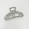 Close-up of silver metal liquid-style hair claw clip with a reflective mirror finish - No.22 Silver Dripping Lava