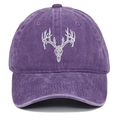Detail of white elk skull embroidery on a purple washed cotton vintage baseball cap - Purple