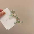 Lot de deux mini pinces à cheveux en acétate avec texture marbrée verte et rose et logo - Pièce Unique / Vert Fleuri