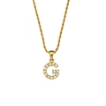 Golden twisted rope chain necklace featuring a zircon-encrusted letter G pendant - Letter G