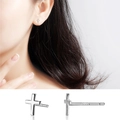 Minimalist S999 sterling silver cross stud earrings with a high polished metallic finish - Cross