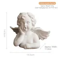 White resin baby angel ornament with size dimensions of 18.5cm length and 14.5cm height - Pouty Angel Figurine
