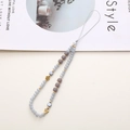 Detail of beaded phone strap with grey and lavender crystals and golden flower accents - K988 Clover Flower Style / K988 Grey Crystal Phone Chain / Gray