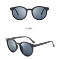 Lunettes de soleil rondes rétro noir mat avec verres gris montrées sous deux angles - Monture Noire Verres Gris