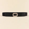 Close-up of a black elastic waist belt featuring a sparkling rhinestone rectangular buckle - Black