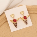 Detailed view of bull head stud earring with red gemstone and vintage gold texture - Red Enamel Gold Bull Style (6#)