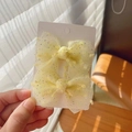 Pair of yellow mesh bow hair clips with silver sequins on white display card - Yellow Mesh Pair