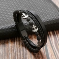 Detail of multilayer men's leather bracelet with volcanic stone beads and silver anchors - Anchor Multi-layer Bracelet / Black + Volcanic Stone