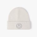 Off-white winter beanie with thick ribbed knit and embroidered grey smiley face icon - One Size / Beige