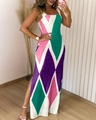 Detail of the sleeveless geometric print dress featuring a chic side slit and textured fabric - S / Green Patchwork Purple