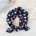 Dark blue cotton linen scarf with cartoon face patterns and a soft floral backdrop - Kids Navy Blue