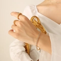 Elegant gold bracelet and ring set with clear crystals shown on a female model - Champagne Zircon Bracelet-17cm