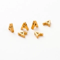 Macro shot of 1.8mm hole gold-plated letter A beads for DIY jewelry making - Letter A / Gold