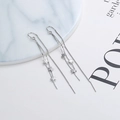 Elegant silver star tassel ear threads with three polished star charms and long chain - Tassel Star Ear Threader-White Gold