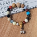 Traditional Eighteen Seeds Buddha bracelet with assorted beads on vintage background - Premium Style (Engraved Lingyin V2)
