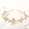 Detail view of golden leaf headband showing 3cm height and 34g weight measurements - Metal Headband-Seven Leaves