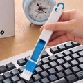 Mini smile keyboard cleaning brush set in blue and white on a mechanical keyboard - Blue Keyboard Cleaning Brush