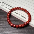 Bracelet ethnique en bois de santal avec perles tonneaux polies brun rouge foncé - Bois de Santal Rouge (Afrique) 7x8mm