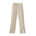 Close-up of beige high-waist flared trousers with front crease seam and minimalist suit fabric - XS / Cream White Pants