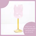 Pink tulip-shaped high borosilicate glass goblet with amber stem and heat-resistant finish - 301-400ml / Pink with Yellow Base