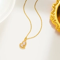 Collana in acciaio al titanio placcato oro 18K con ciondolo a cuore in zirconi micro - 560 Collana a Cuore / Oro