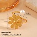 Gold stainless steel adjustable ring with a small flower motif and a white pearl accent - 901G-2 / Gold