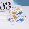 Kids dinosaur print sun hat in white cotton with adjustable windproof chin strap - 7 White-based Dinosaurs / 54cm