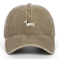 Detailed close-up of a white dachshund embroidery on a tan washed cotton baseball cap - One Size / Khaki