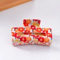 Claw hair clip with red and yellow floral pattern made of durable acrylic material - Orange Yellow Floral