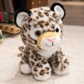 Cute plush leopard doll with realistic spots and soft fur sitting on a rug - 24cm