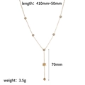 Vue détaillée du collier en Y doré avec étoiles en zircon et mesures de taille - Style Soleil Étoile (TN3684)