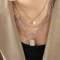 Three-layer silver necklace with pearl drop, paperclip chain and engraved face pendant - Three Layer Necklace / Steel