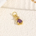 Detailed macro view of heart-shaped purple zircon turtle pendant in 18k gold plating - Purple (Humanoid Style)