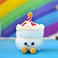 Detailed close-up of a cute blue cake plush keychain with a candle and happy face - 12cm (Rainbow Rope) / Blue