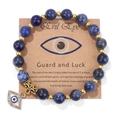 Deep blue beaded bracelet featuring gold accents and a sparkling blue evil eye charm - 19cm / Blue Sodalite