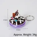 Porte-clés macaron violet avec crème chocolat, noix et cristaux brillants - Décoration beignet noix (avec porte-clés) / 4.50cm / Marron